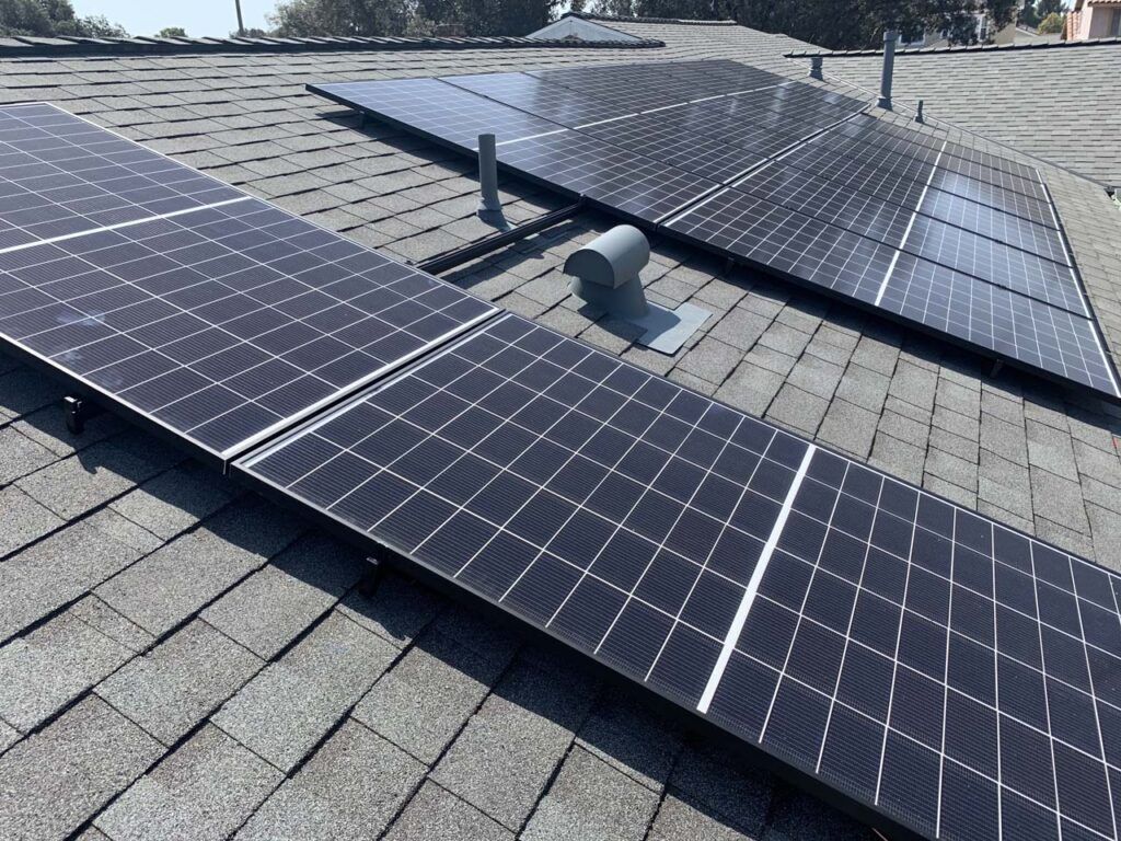Looking across the installed solar panels atop the new roof of our home