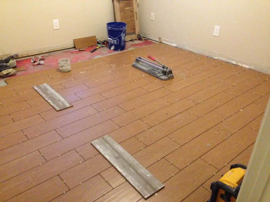 Tile work being done by our own trusted tile contractor instead of the property manager's guy