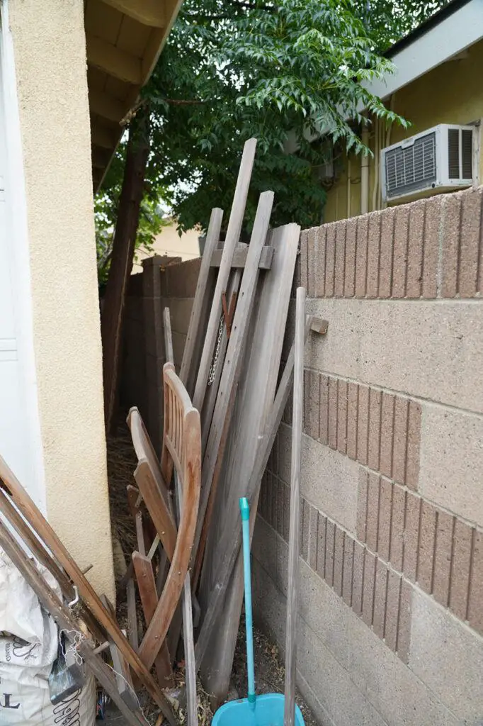 Our tenants at the time didn't do us any favors (as far as rats and termites) by leaving large lumber pieces next to the house